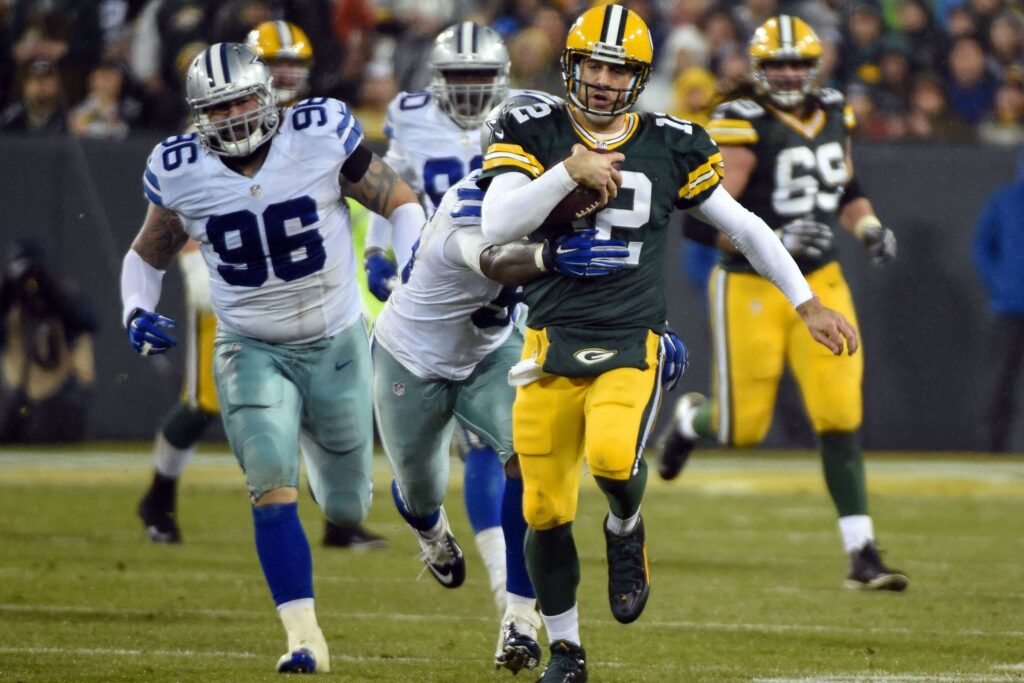 USATSI Packers QB Aaron Rodgers scrambles vs the Cowboys