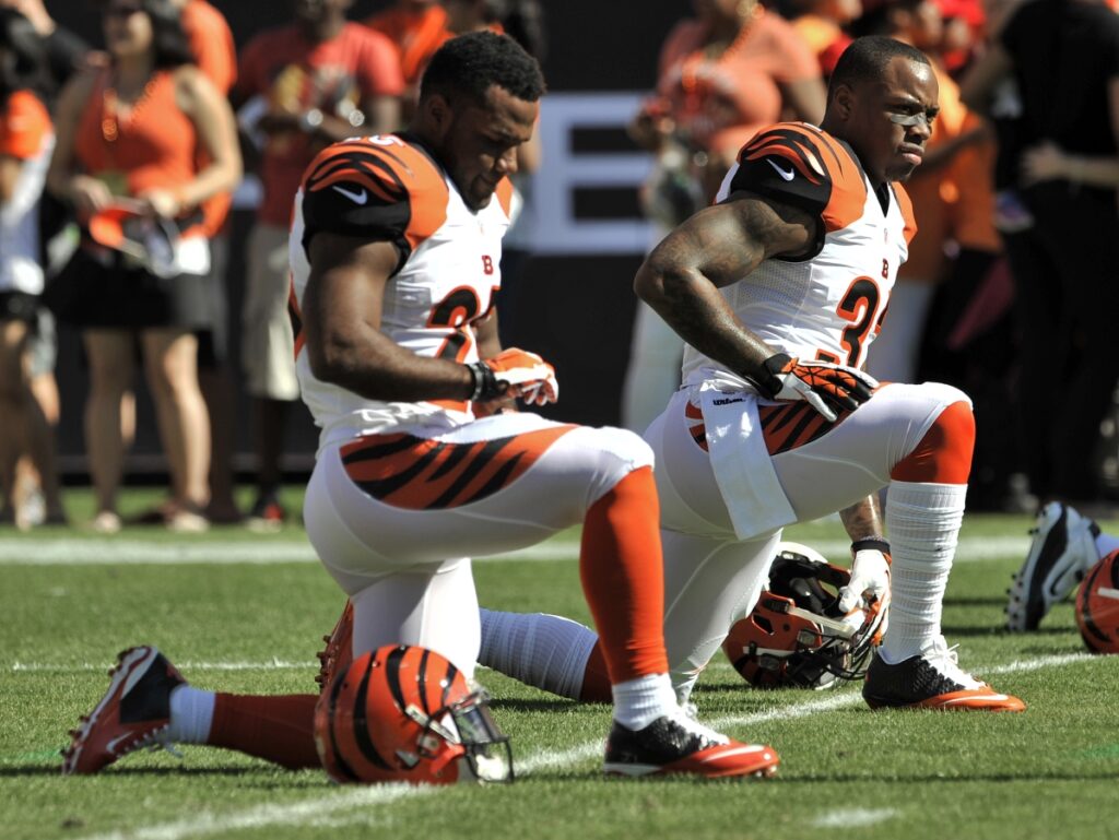 AP Image. Bengals running backs Giovani Bernard and Jeremy Hill stretch prior to a game.