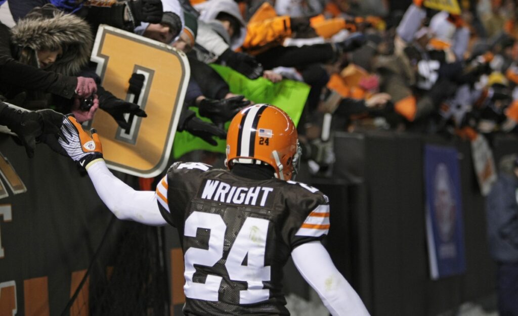 AP Image. Browns CB Eric Wright celebrates with fans after their win against the Steelers on December 10. 2009.