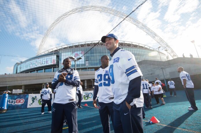 AP Image. Dallas Cowboy QB Tony Romo takes part in an NFL community event in London Tuesday.