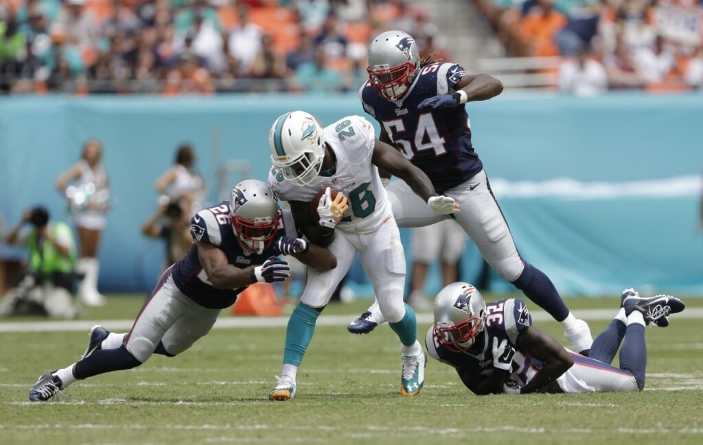 AP Photo. Knowshon Moreno is expected to return to action today for the Dolphins against the Packers.