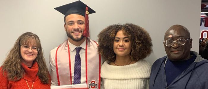 Austin Mack Parents: Austin Mack, adorned in cap and gown, stands tall, flanked by the unwavering support of his loving family