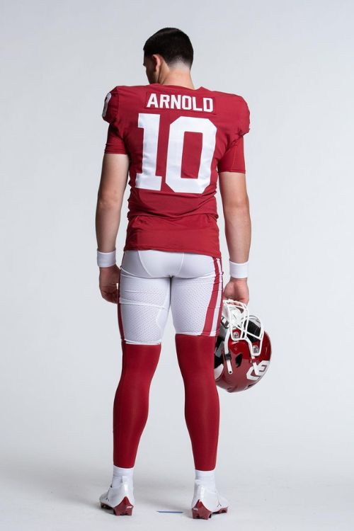 Standing tall, embodying the spirit of a true Sooner. Jackson Arnold is ready to conquer the field.