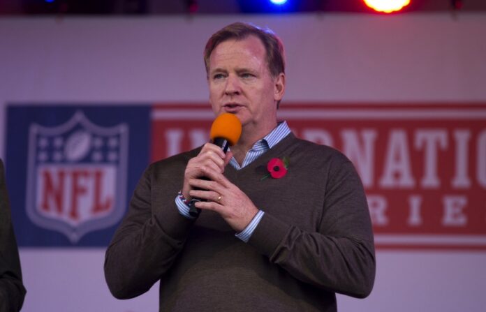 AP Images. NFL Commissioner addresses an audience in London.
