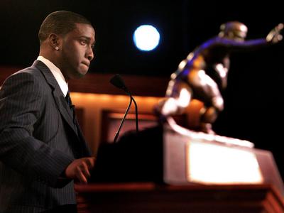 Reggie Bush was a dangerous back and returner, but he also returned the trophy.