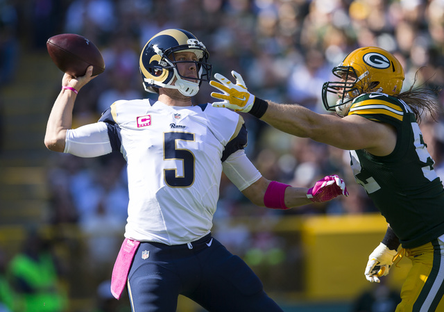 USATSI, Rams QB Nick Foles throws off his back foot as pressure is applied by Packers LB Clay Matthews