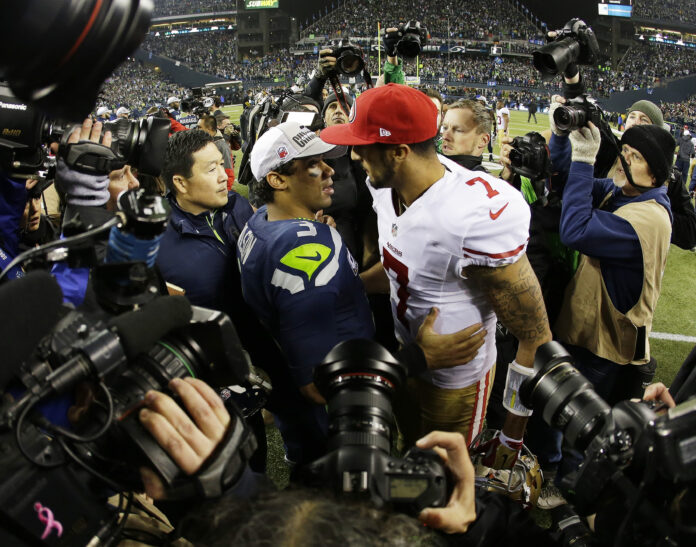 AP Photo. Russell Wilson and Colin Kaepernick have had big success for little dollars (until Kaepernick's recent extension).